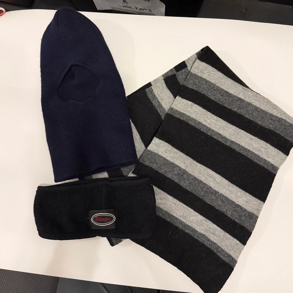 Black and gray scarf, black, headband, and black face mask.